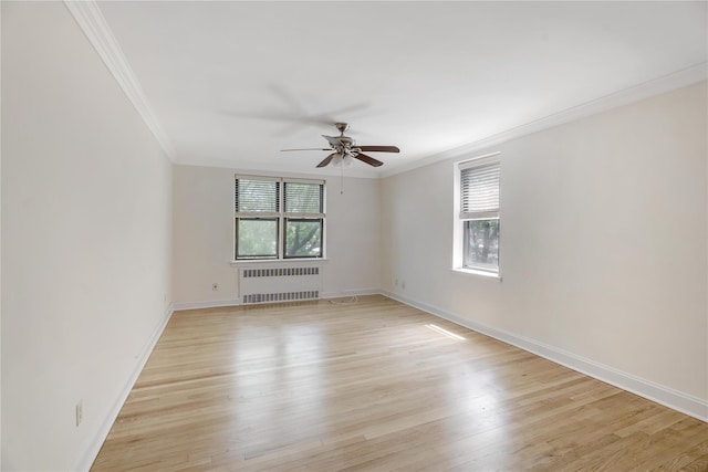 302 96th St Unit 5A, Brooklyn, NY 11209 - unfurnished room featuring radiator, ornamental molding, light wood finished floors, and ceiling fan