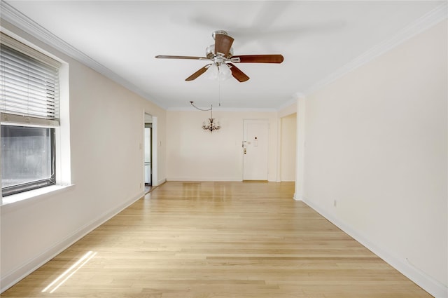 302 96th St Unit 5A, Brooklyn, NY 11209 - spare room featuring ceiling fan, light wood-style floors, ornamental molding, and a chandelier