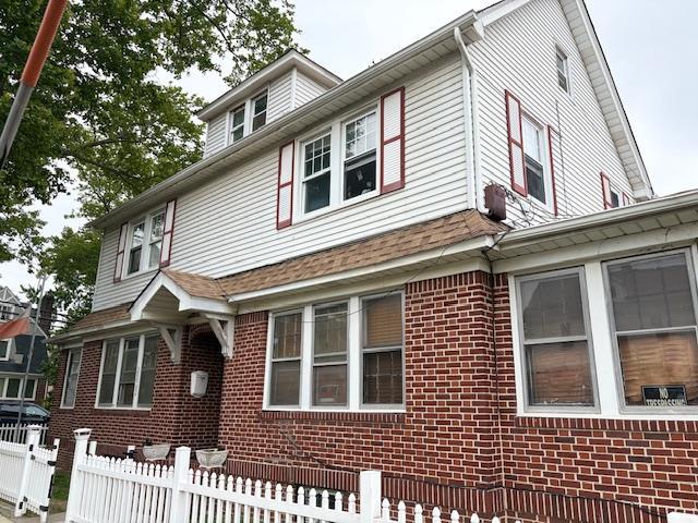 200-02 104th Ave, Saint Albans, NY 11412 - view of front of home with brick siding