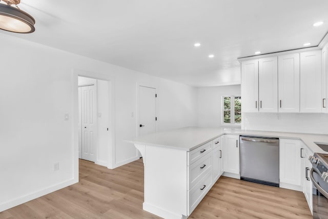 50 Appletree Dr, Saugerties, NY 12477 - kitchen with stainless steel appliances, recessed lighting, a peninsula, light wood finished floors, and light countertops