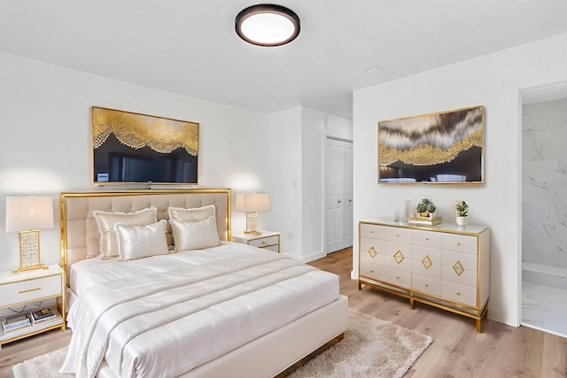 50 Appletree Dr, Saugerties, NY 12477 - bedroom with light wood-style flooring and ensuite bath