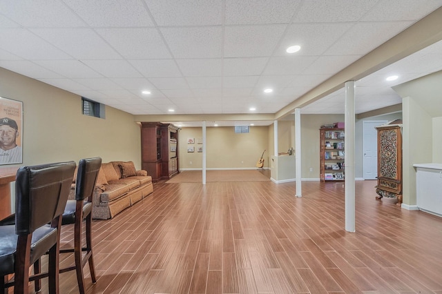 28 Hamlet Dr, Commack, NY 11725 - living room featuring a paneled ceiling, light wood finished floors, and recessed lighting