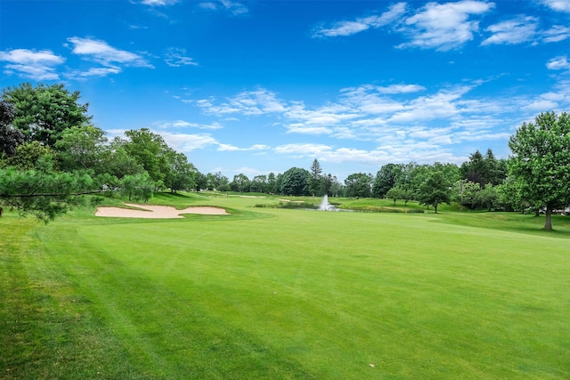 28 Hamlet Dr, Commack, NY 11725 - view of property's community featuring view of wooded area, a lawn, and view of golf course