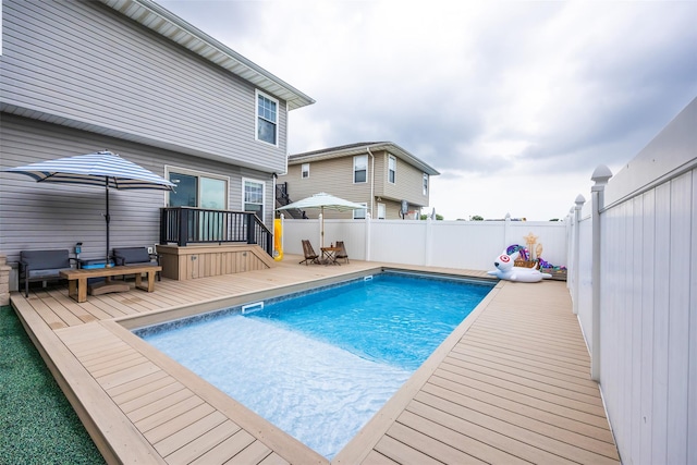 1200 Roger Rd, North Bellmore, NY 11710 - view of pool with a deck and a fenced backyard