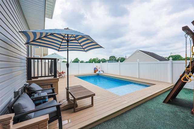 1200 Roger Rd, North Bellmore, NY 11710 - view of pool featuring a fenced backyard and a wooden deck