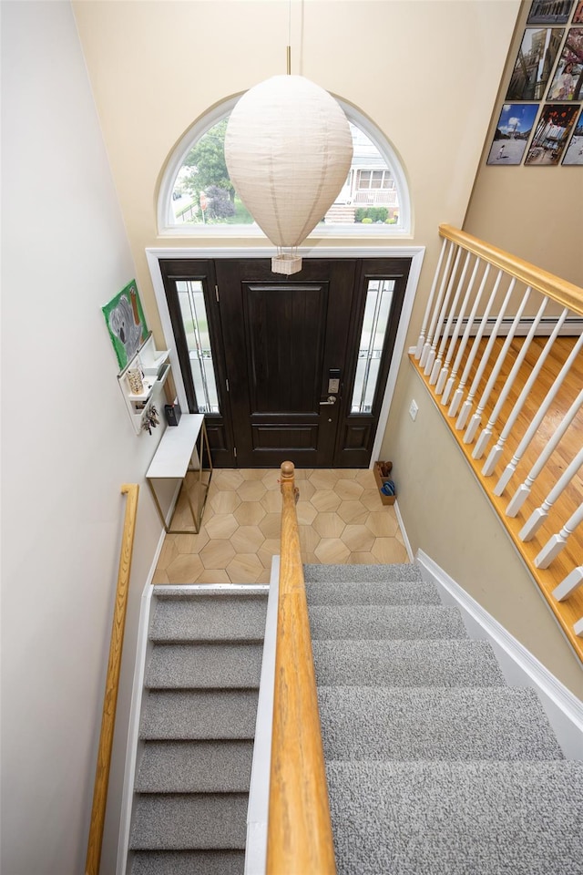 1200 Roger Rd, North Bellmore, NY 11710 - tiled entrance foyer with stairs