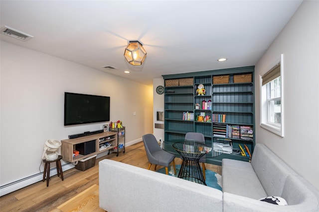1200 Roger Rd, North Bellmore, NY 11710 - living room with wood finished floors and recessed lighting