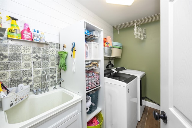 1200 Roger Rd, North Bellmore, NY 11710 - laundry area featuring washer and clothes dryer and wood finished floors
