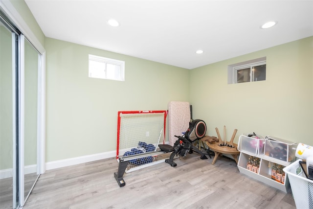1200 Roger Rd, North Bellmore, NY 11710 - workout room with wood finished floors and recessed lighting
