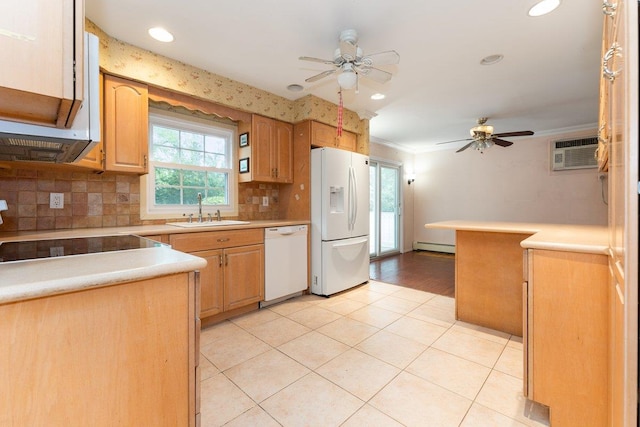 2609 Parkview Pl, Baldwin, NY 11510 - kitchen with white appliances, a ceiling fan, ornamental molding, decorative backsplash, and baseboard heating