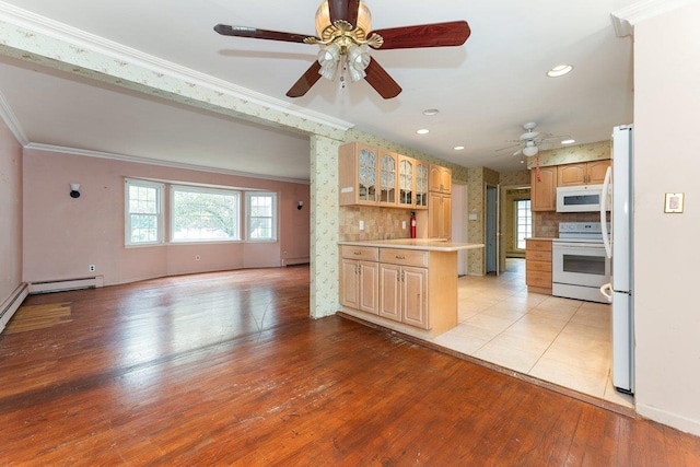 2609 Parkview Pl, Baldwin, NY 11510 - kitchen with white appliances, light countertops, ceiling fan, glass insert cabinets, and ornamental molding