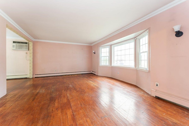 2609 Parkview Pl, Baldwin, NY 11510 - empty room with a baseboard radiator, wood-type flooring, a baseboard heating unit, ornamental molding, and an AC wall unit