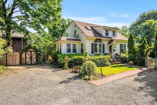 2564 Central Ave Unit B, Baldwin, NY 11510 - view of front of house featuring an outbuilding and a shingled roof