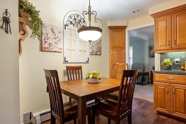2564 Central Ave Unit B, Baldwin, NY 11510 - dining area with a baseboard heating unit and dark wood finished floors