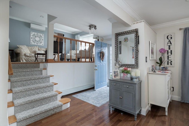 3483 Steven Rd, Baldwin, NY 11510 - stairs with a baseboard radiator, ornamental molding, a wall mounted air conditioner, and wood finished floors