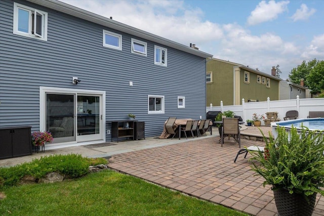 3483 Steven Rd, Baldwin, NY 11510 - rear view of house with a patio