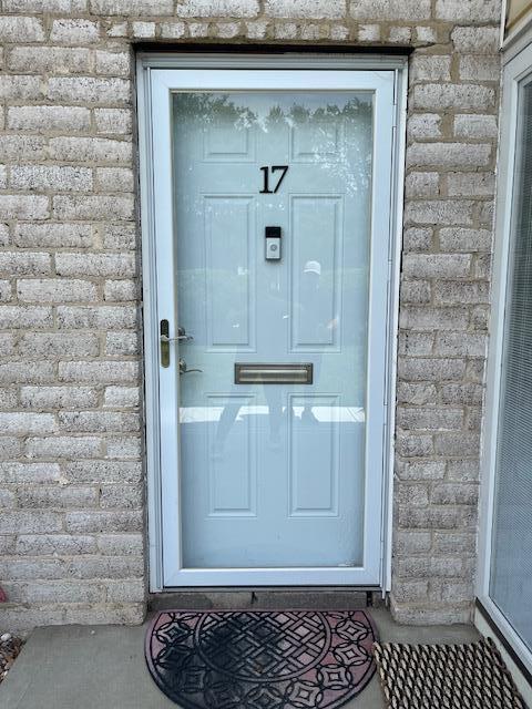 17 Pueblo Ct Unit 17, Coram, NY 11727 - property entrance with brick siding