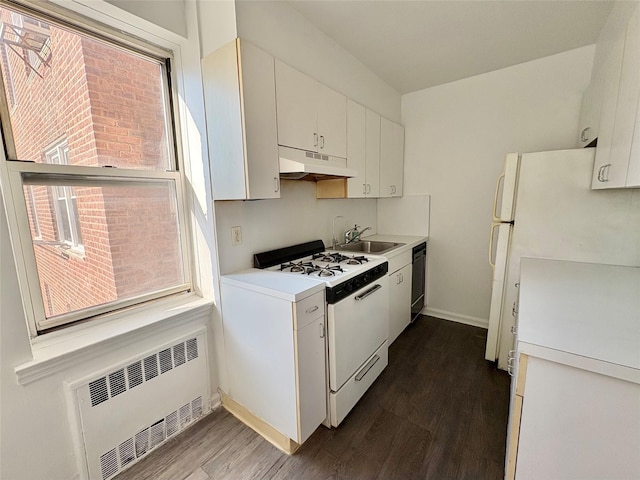 63-61 Yellowstone Blvd Unit 3E, Forest Hills, NY 11375 - kitchen with white appliances, radiator, under cabinet range hood, dark wood finished floors, and light countertops