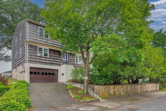 32 Brady Ave, New Rochelle, NY 10805 - view of front of home with a garage and driveway