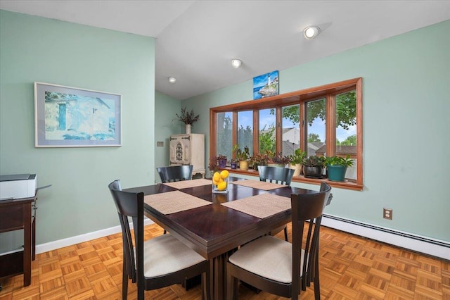 32 Brady Ave, New Rochelle, NY 10805 - dining space featuring a baseboard radiator, recessed lighting, and lofted ceiling