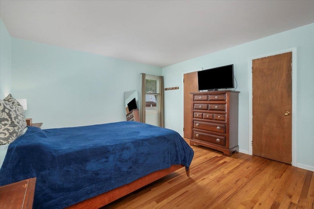 32 Brady Ave, New Rochelle, NY 10805 - bedroom with light wood-style flooring and baseboards