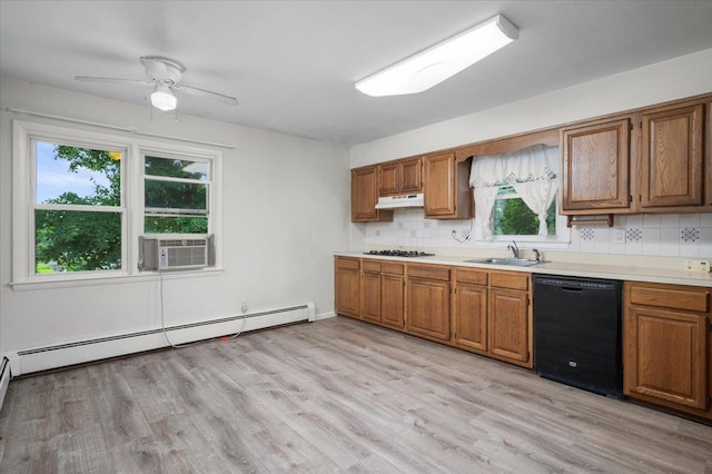 32 Brady Ave, New Rochelle, NY 10805 - kitchen featuring black dishwasher, baseboard heating, brown cabinetry, and decorative backsplash