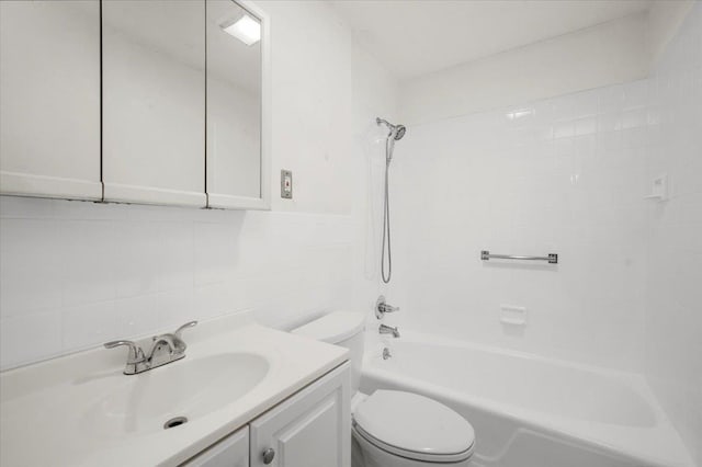 32 Brady Ave, New Rochelle, NY 10805 - full bathroom featuring bathing tub / shower combination, vanity, decorative backsplash, and tile walls