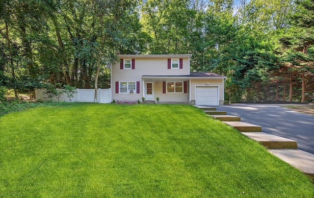 1152 N Country Rd, Stony Brook, NY 11790 - traditional-style home featuring a garage and asphalt driveway