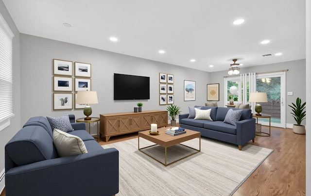 1152 N Country Rd, Stony Brook, NY 11790 - living room featuring light wood finished floors and recessed lighting