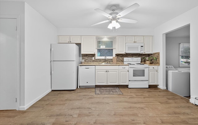 1152 N Country Rd, Stony Brook, NY 11790 - kitchen featuring white appliances, backsplash, a ceiling fan, and light countertops