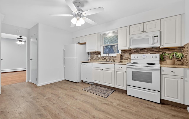 1152 N Country Rd, Stony Brook, NY 11790 - kitchen featuring white appliances, ceiling fan, a baseboard radiator, decorative backsplash, and white cabinets