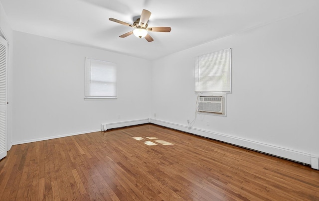 1152 N Country Rd, Stony Brook, NY 11790 - spare room with baseboard heating, cooling unit, a ceiling fan, wood-type flooring, and a baseboard heating unit
