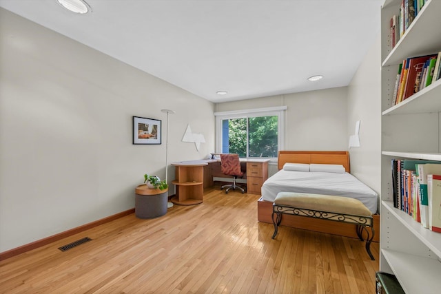 3 Horseshoe Ln, Great Neck, NY 11020 - bedroom with an office area and wood-type flooring