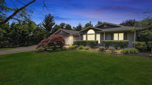12 Hasting Dr, Stony Brook, NY 11790 - ranch-style home with a lawn, a garage, driveway, and a shingled roof