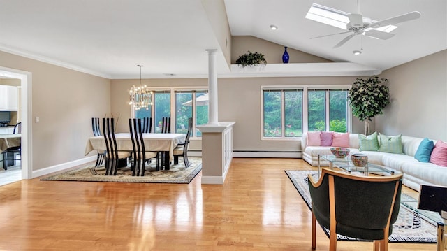 12 Hasting Dr, Stony Brook, NY 11790 - living room with baseboard heating, ornate columns, a chandelier, light wood-style flooring, and ceiling fan