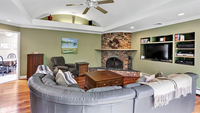 12 Hasting Dr, Stony Brook, NY 11790 - living room with a ceiling fan, wood finished floors, lofted ceiling, a fireplace, and recessed lighting