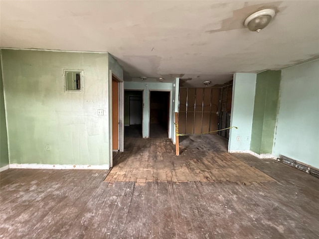 1754 Givan Ave, Bronx, NY 10469 - unfurnished living room featuring wood-type flooring and electric panel