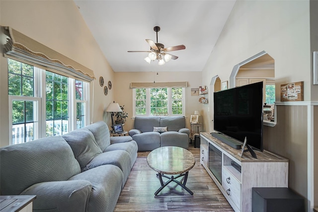 8 Glenwood Pl, Farmingville, NY 11738 - living area featuring dark wood finished floors, ceiling fan, and high vaulted ceiling
