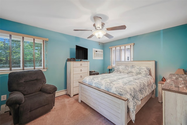 8 Glenwood Pl, Farmingville, NY 11738 - bedroom with light carpet, baseboard heating, and a ceiling fan