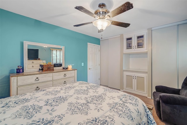 8 Glenwood Pl, Farmingville, NY 11738 - carpeted bedroom with two closets and ceiling fan
