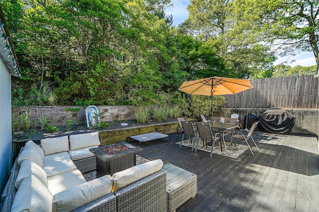 8 Glenwood Pl, Farmingville, NY 11738 - wooden deck featuring outdoor lounge area, outdoor dining area, and a fenced backyard