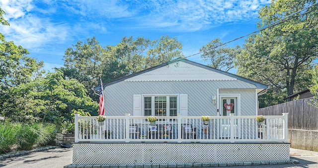 8 Glenwood Pl, Farmingville, NY 11738 - back of house featuring a wooden deck