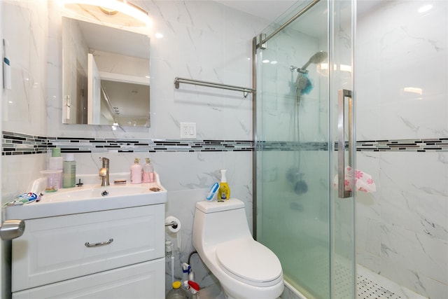 5 Bellingham Ln, Great Neck, NY 11023 - full bath featuring a marble finish shower, vanity, tile walls, and tasteful backsplash