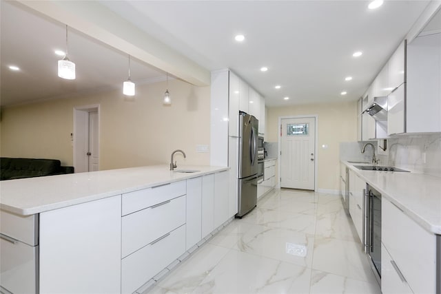 5 Bellingham Ln, Great Neck, NY 11023 - kitchen featuring modern cabinets, freestanding refrigerator, white cabinets, recessed lighting, and a peninsula