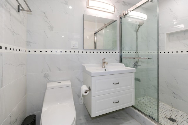5 Bellingham Ln, Great Neck, NY 11023 - bathroom with tile walls, a marble finish shower, vanity, and marble finish flooring
