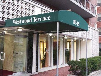 89-15 Parson Blvd W-P, Unit W-P, Jamaica, NY 11432 - entrance to property with brick siding