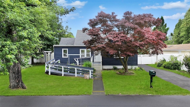 17 Pinetree Dr, Shirley, NY 11967 - view of front of home with a shingled roof