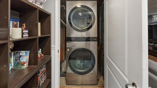 27 Lidge Dr, Farmingville, NY 11738 - laundry area featuring stacked washer / drying machine