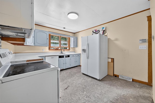 1973 State Route 17k, Montgomery, NY 12549 - kitchen with white appliances, crown molding, light countertops, and range hood