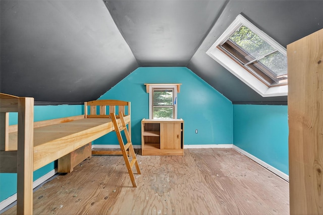 1973 State Route 17k, Montgomery, NY 12549 - bedroom with vaulted ceiling, hardwood / wood-style flooring, and a skylight